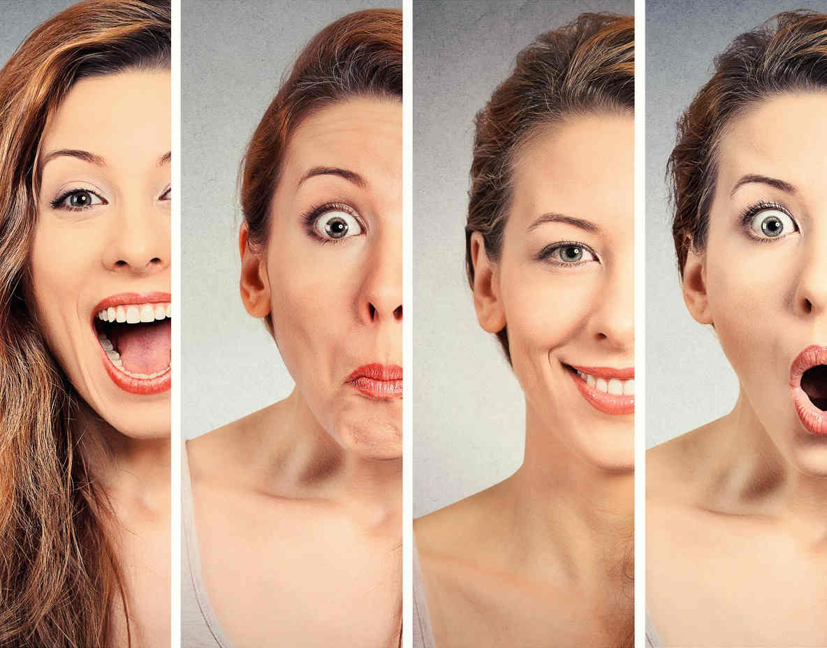 A composite image of a woman’s face divided into four vertical segments, each showing different emotions: wide-mouthed joy, surprise with pursed lips, a slight smile, and wide-eyed shock with mouth open. The background is neutral gray. Do Botox injections make it hard to understand emotions?