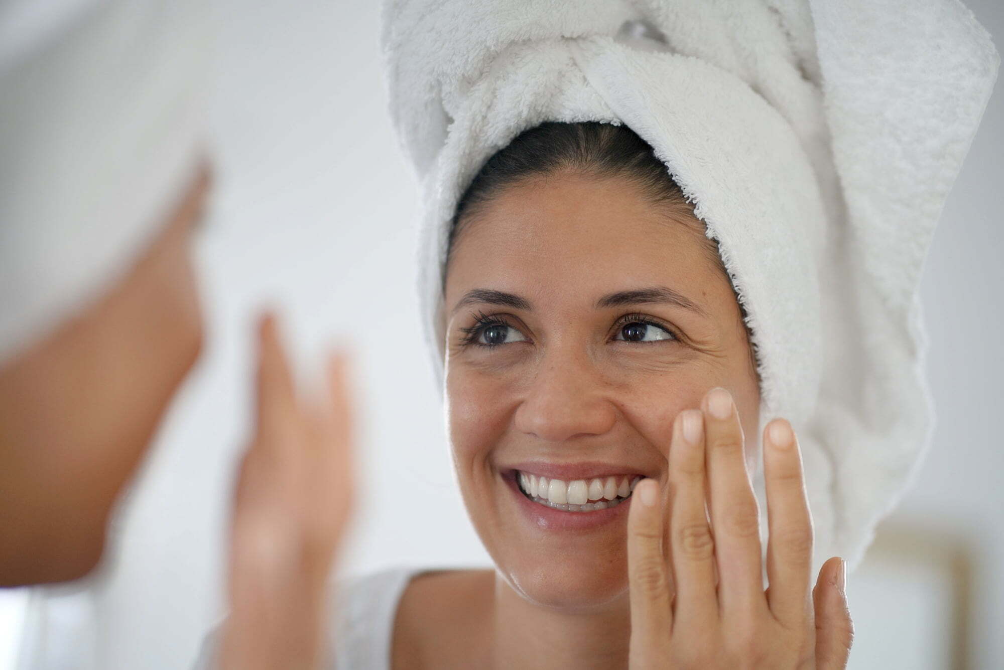 woman applying a skincare product