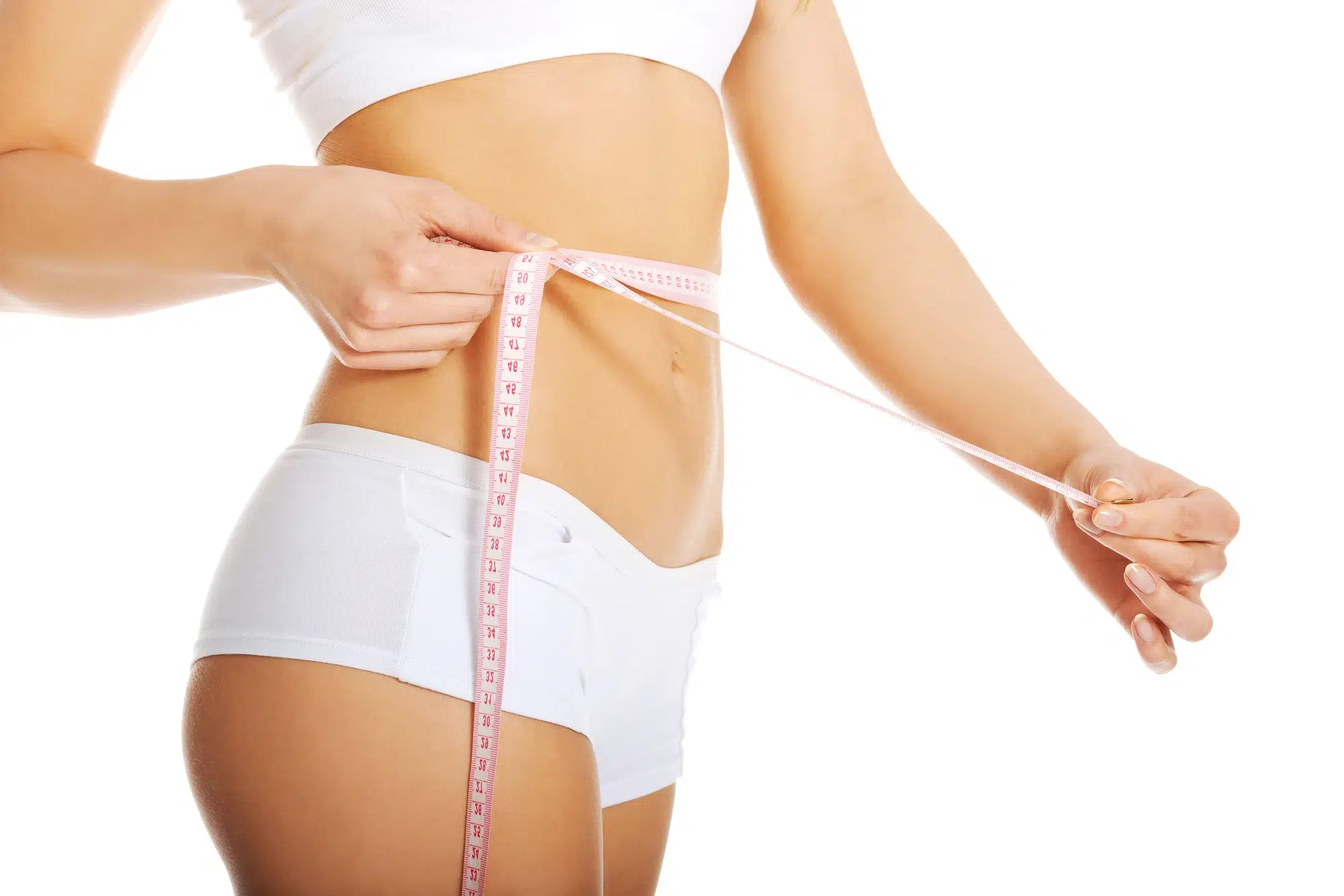 woman measuring waist after botox in stomach injections