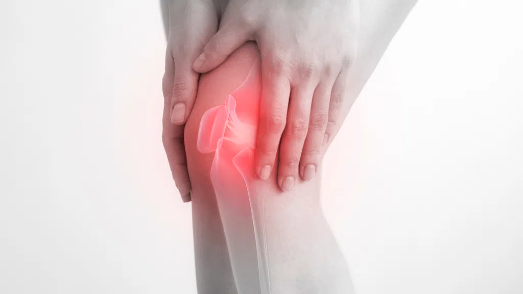 An individual suffering from knee pain.