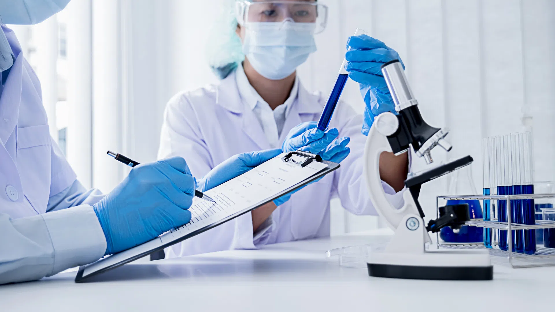Medical experts studying and researching a formulation's efficacy.