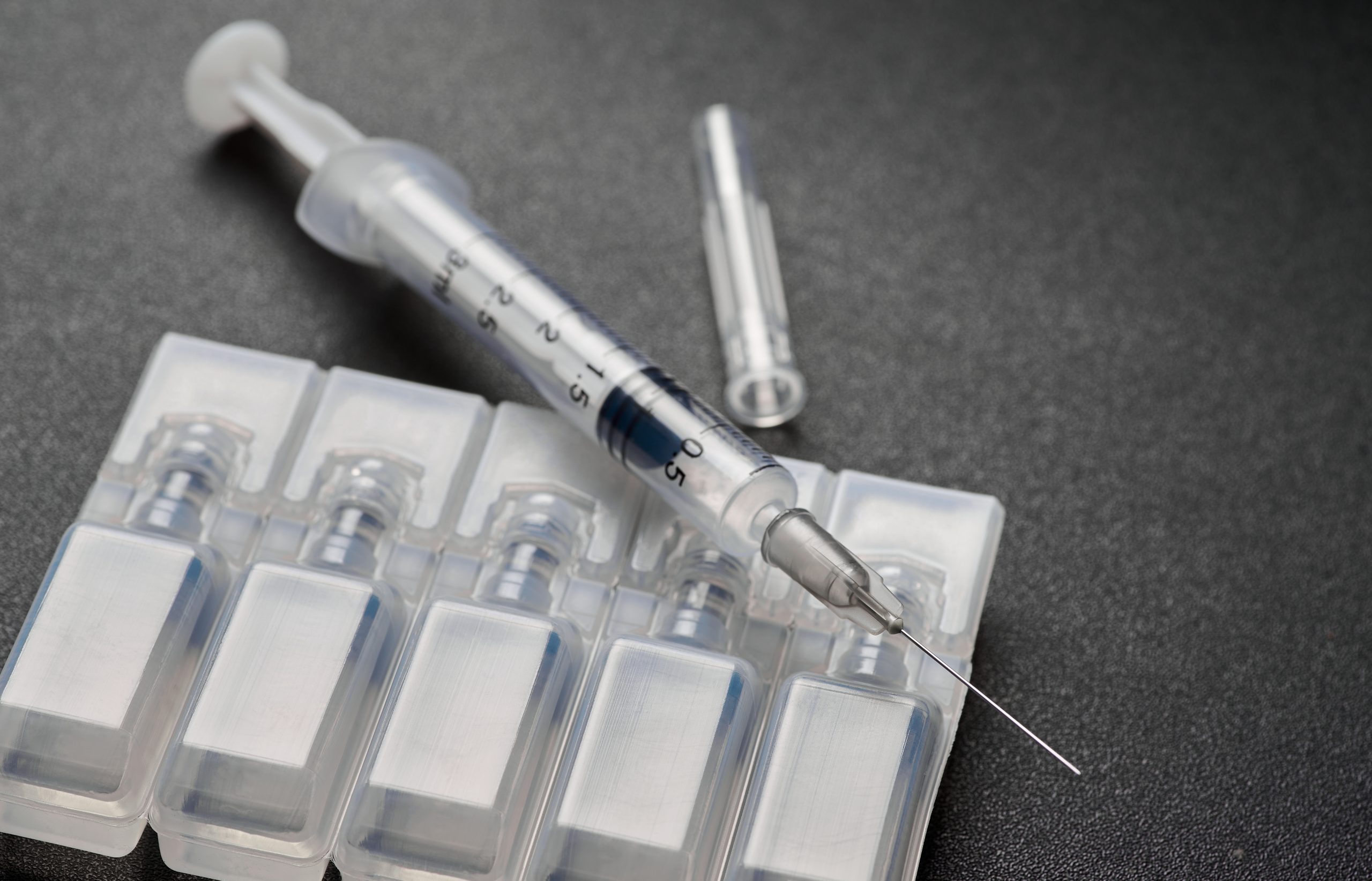 A medical syringe with solution's vials.