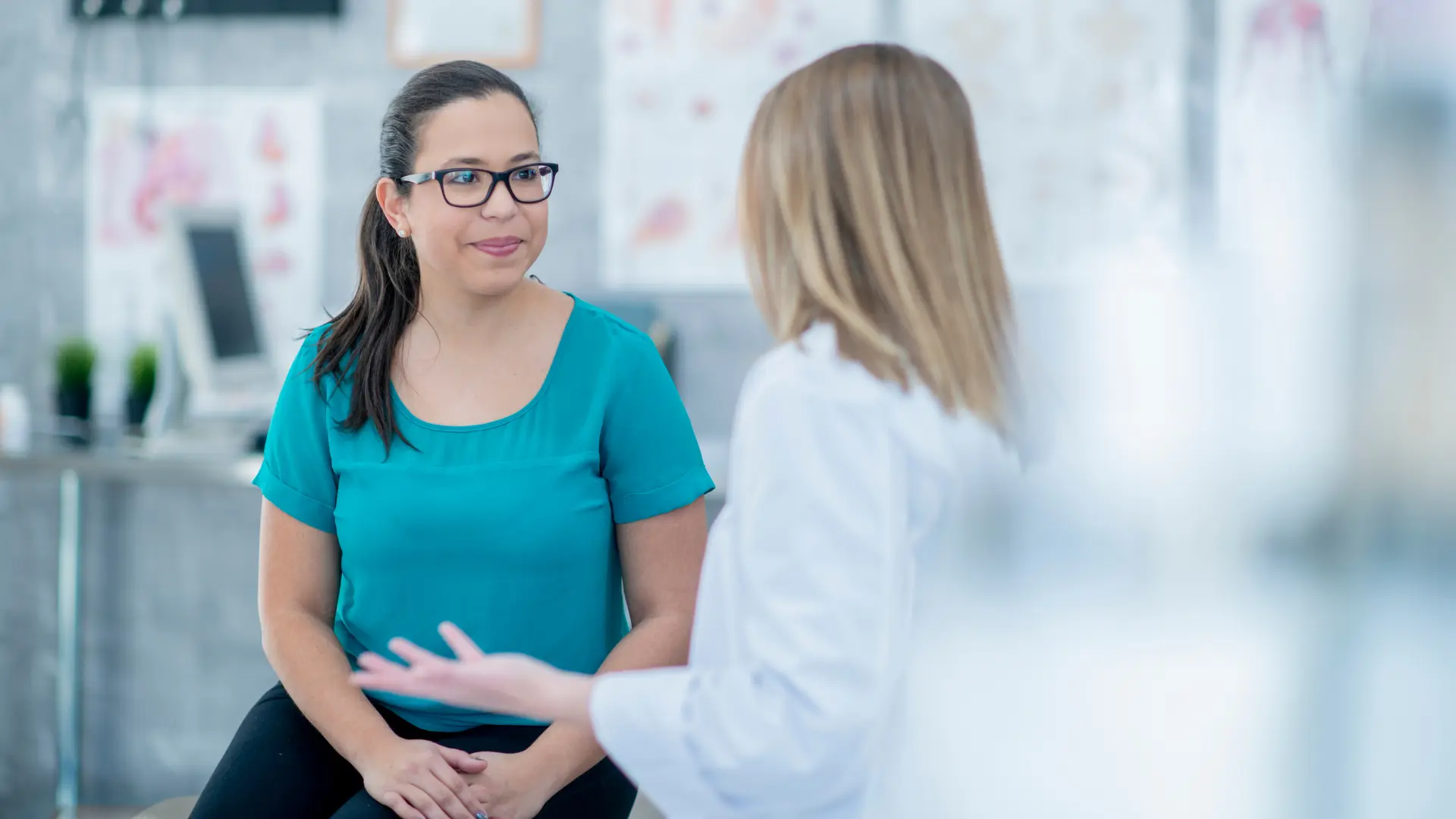 A doctor and patient communicating about their treatment.