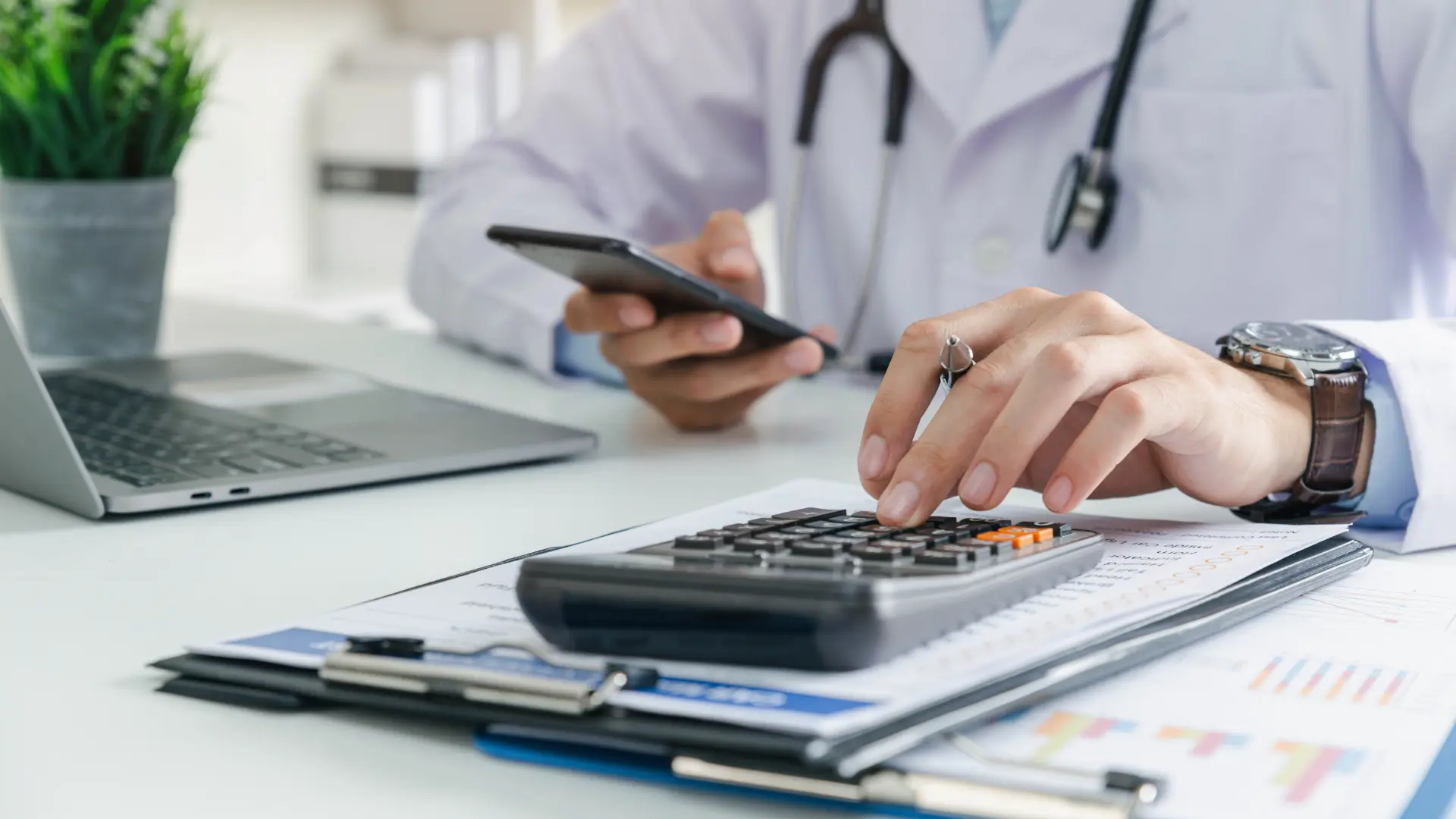 A medical professional computing a treatment's cost.