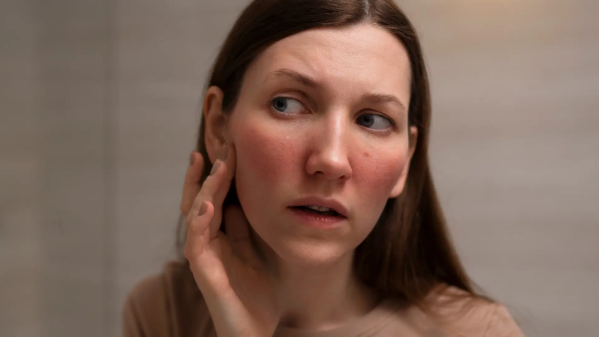 An individual worried about her face condition.