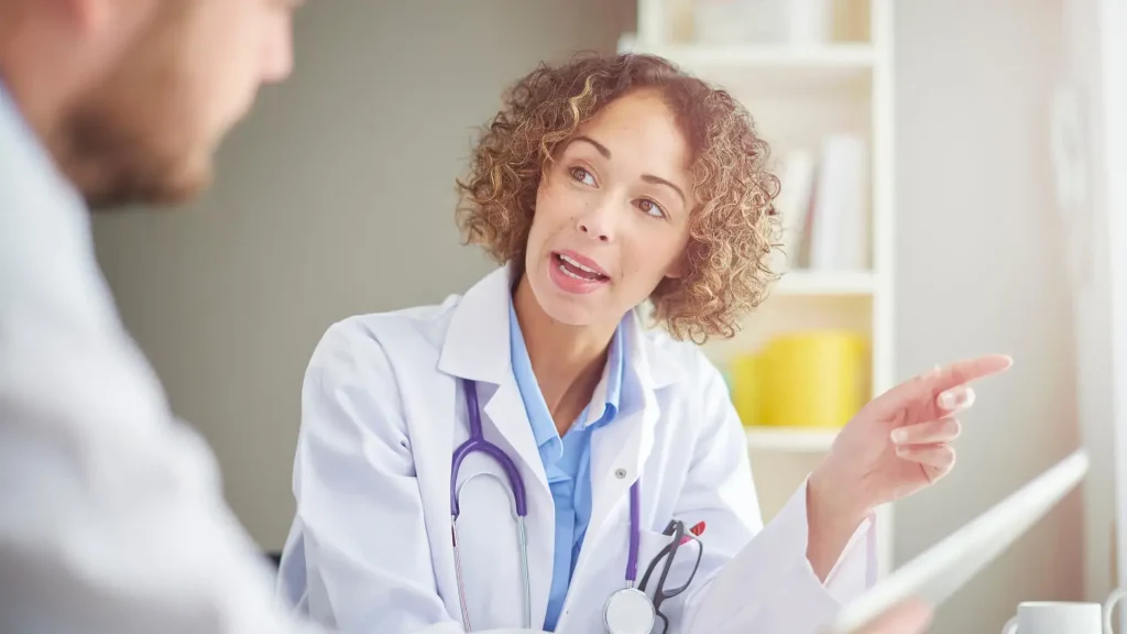 A medical professional explaining a treatment.