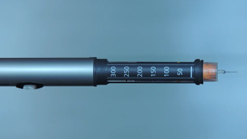 A close-up shot of an injectable pen.