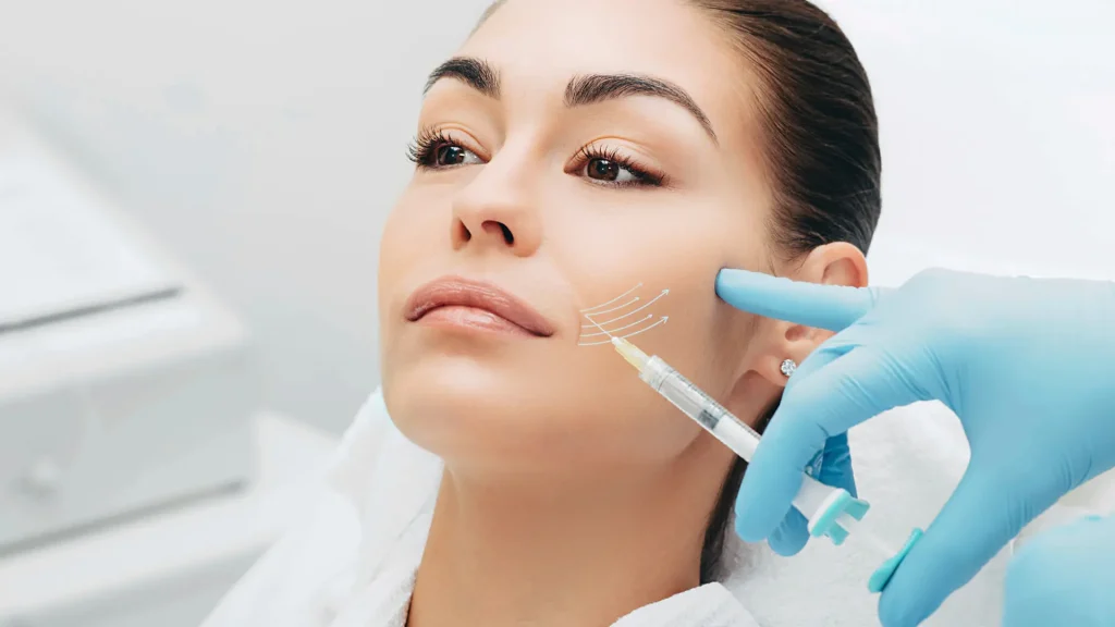 An individual receiving a facial injection.