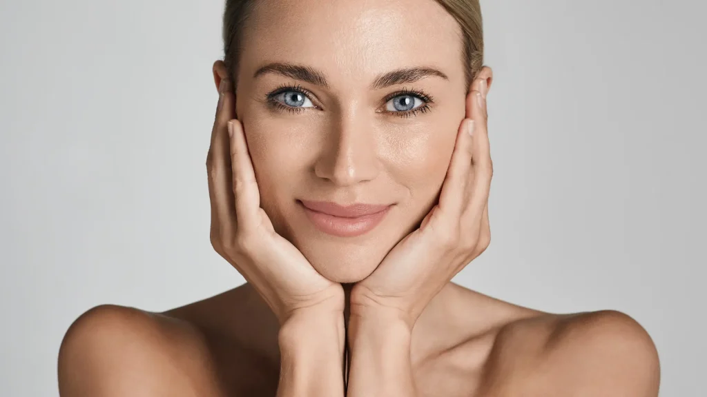An individual showing off their healthy, smooth skin.