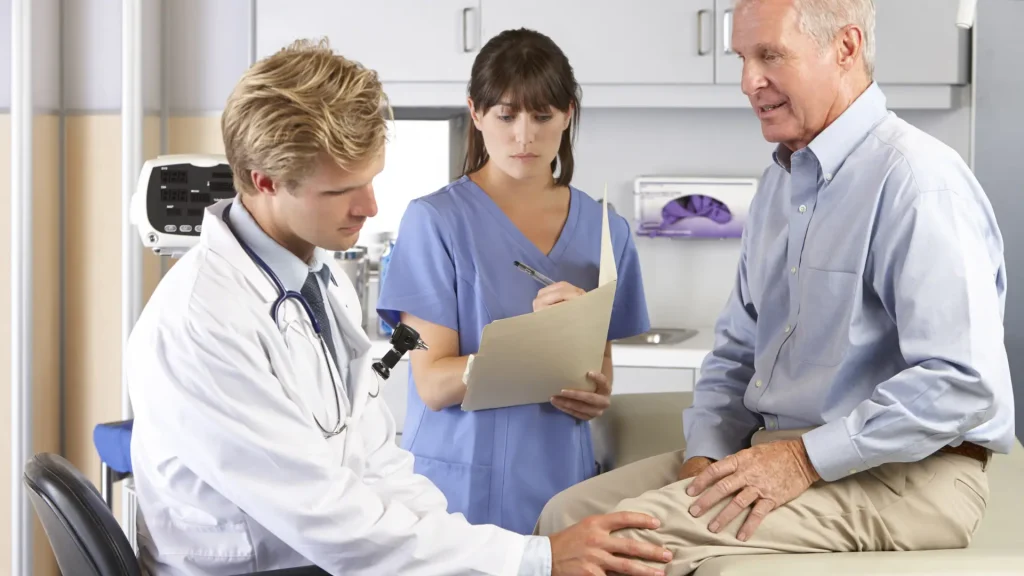 An individual getting a consultation from a medical professional.