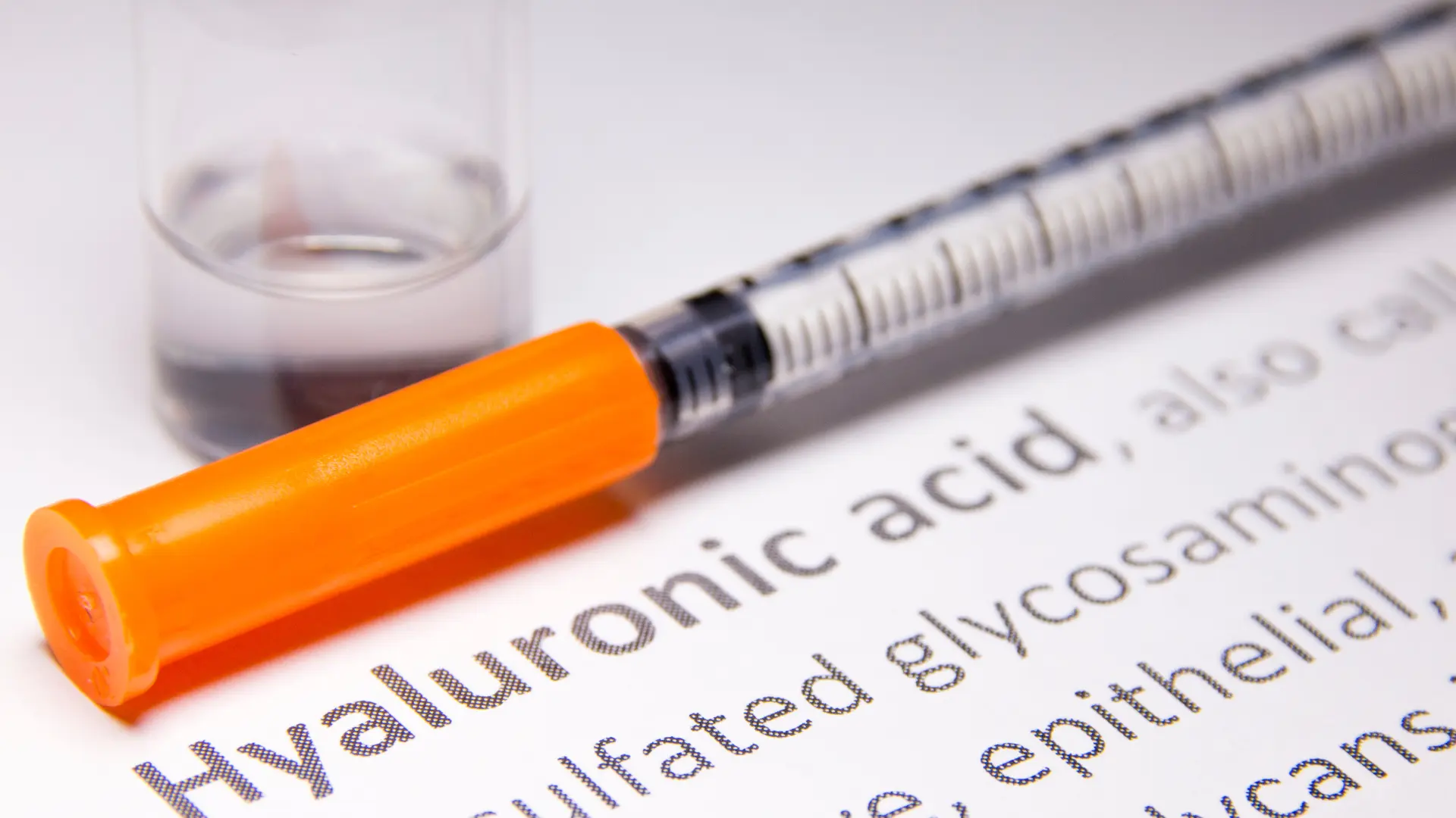 A close-up shot of a hyaluronic acid injection and solution.