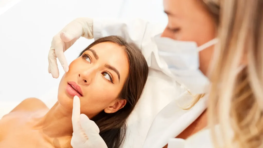An individual undergoing an evaluation with a medical practitioner.
