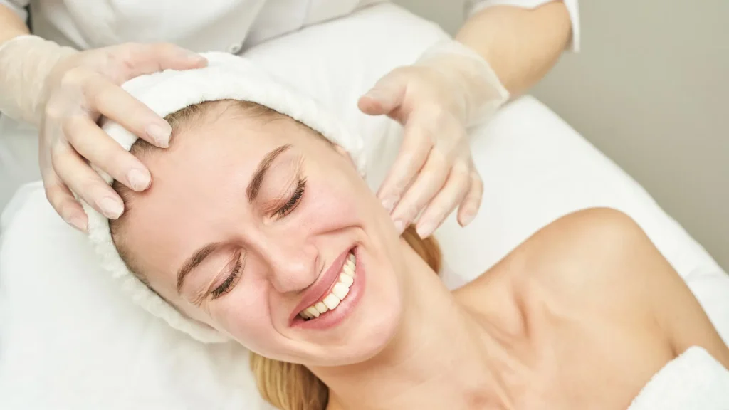 An individual undergoing a facial examination.