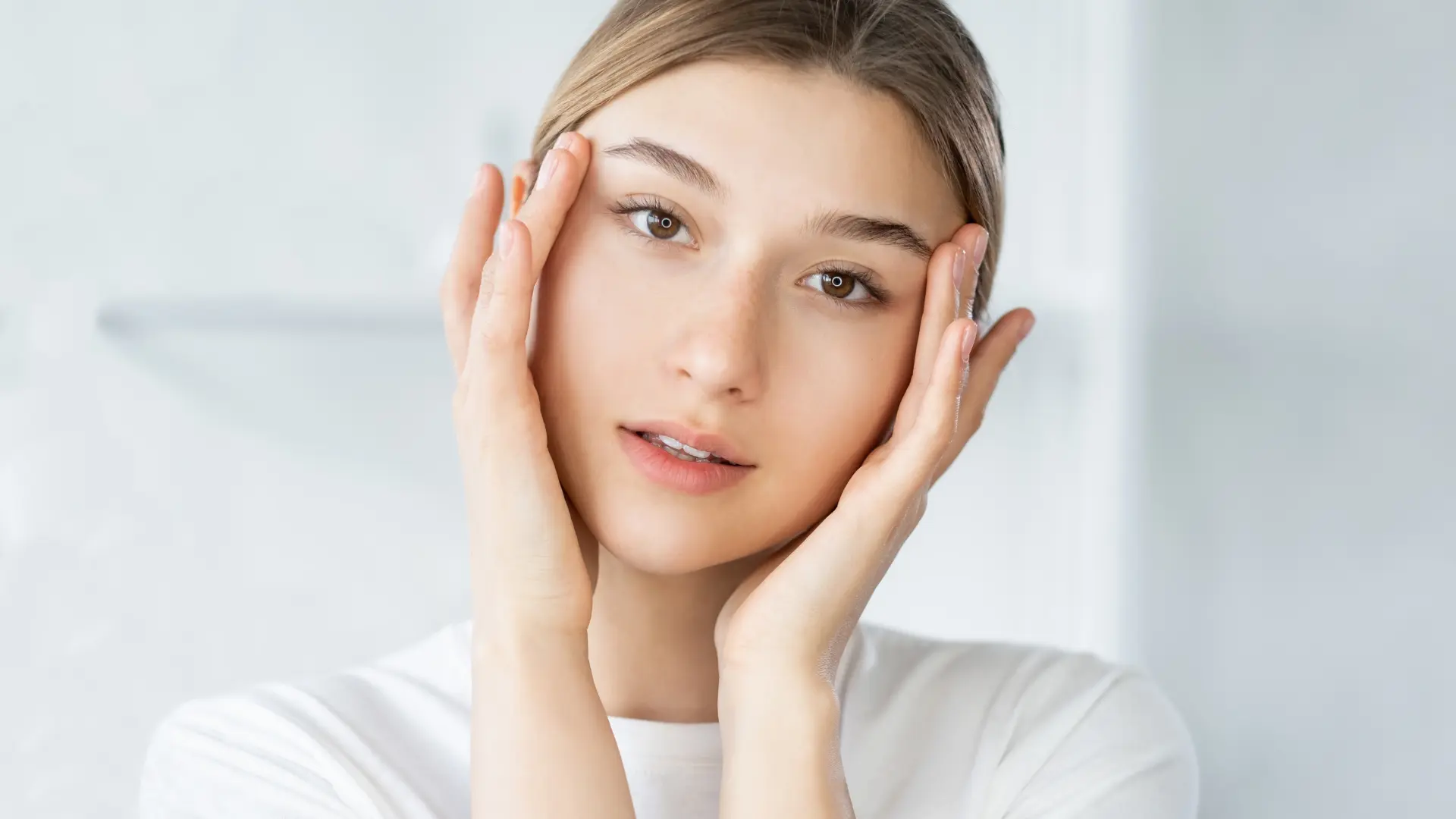 An individual showcasing their smooth and radiant appearance.