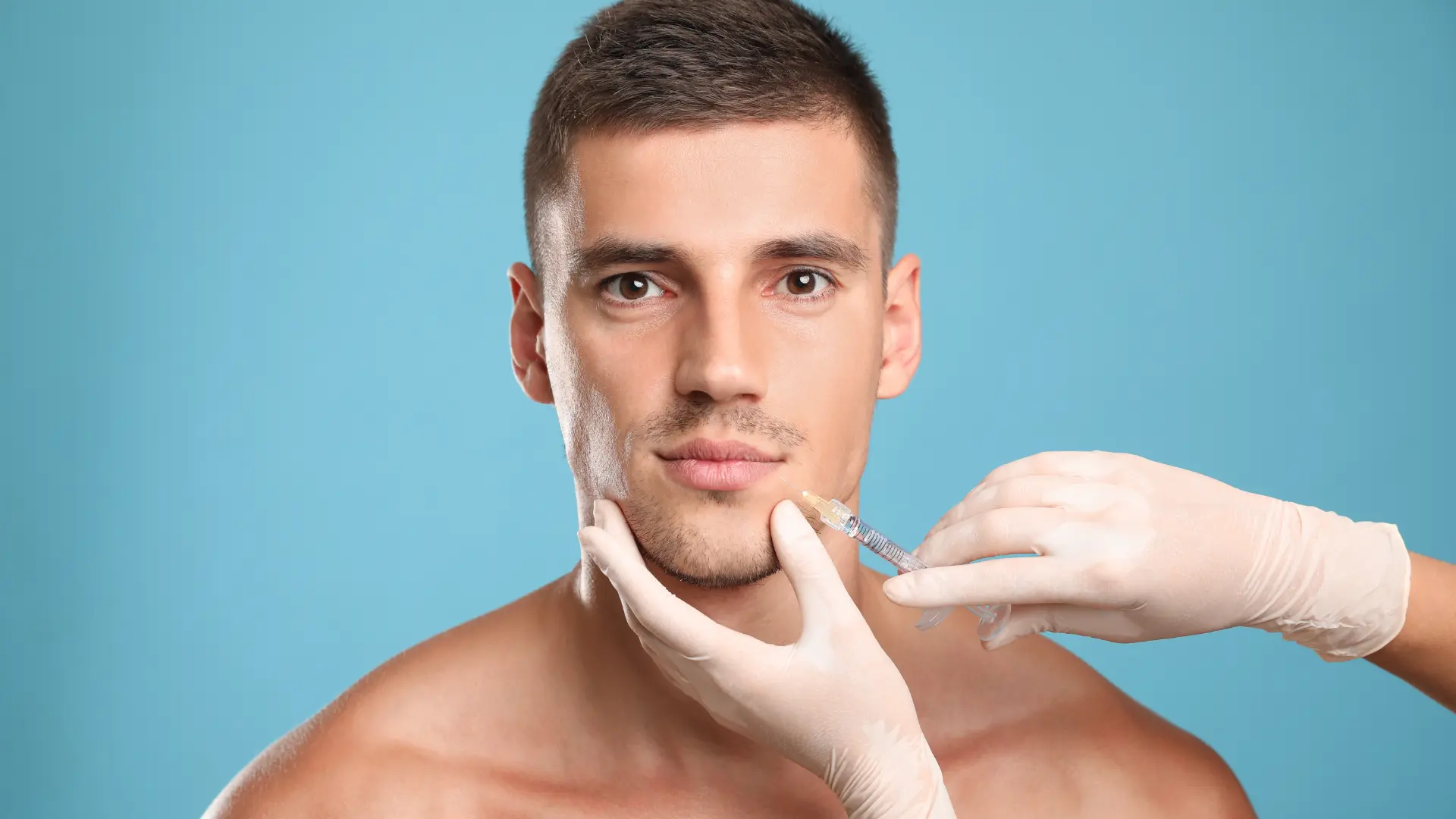 An individual receiving a facial injection for their concern.