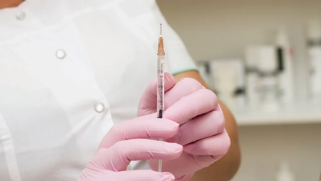 A close-up shot of a medical syringe.