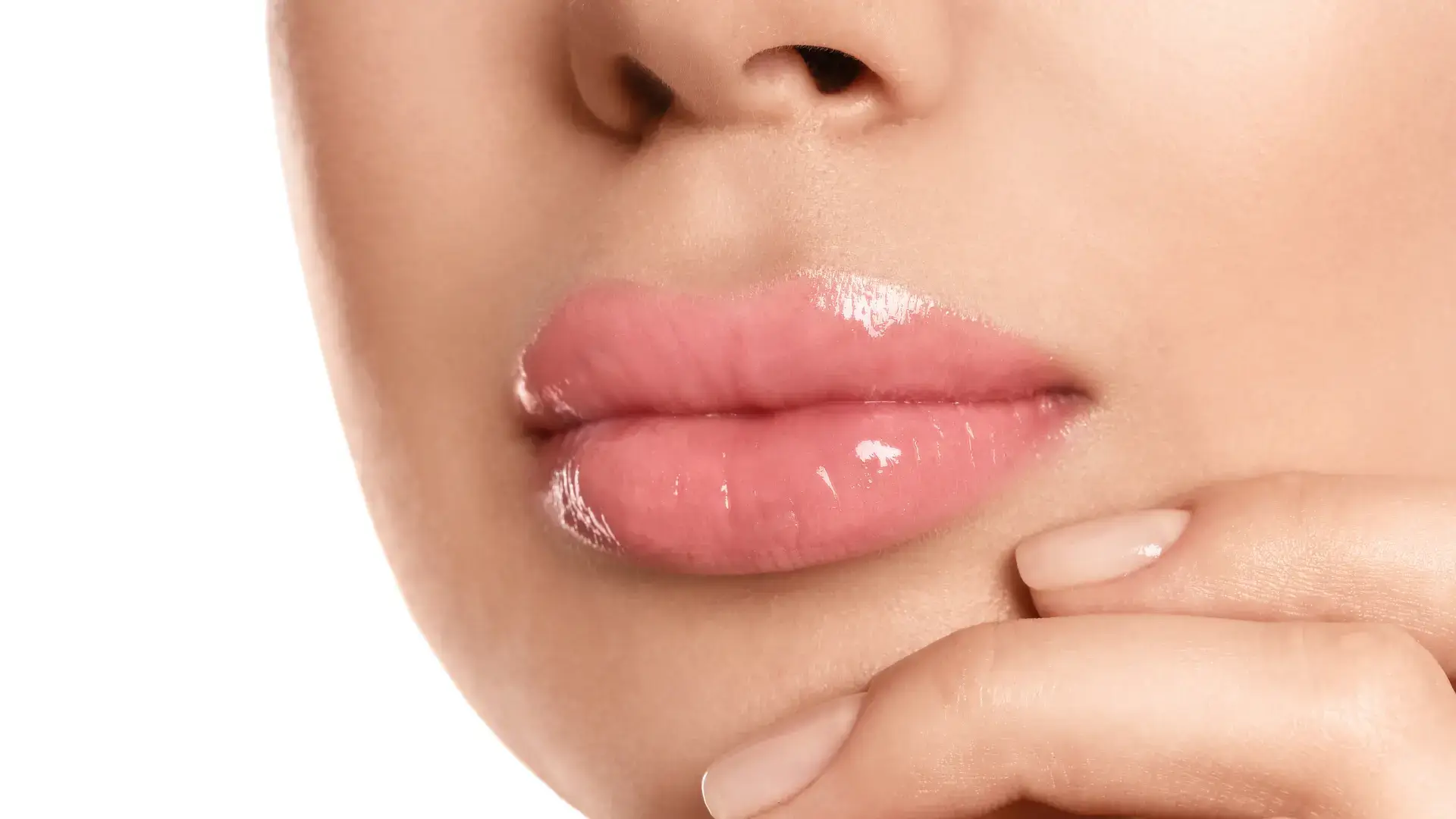 A close-up shot a full, defined lips.