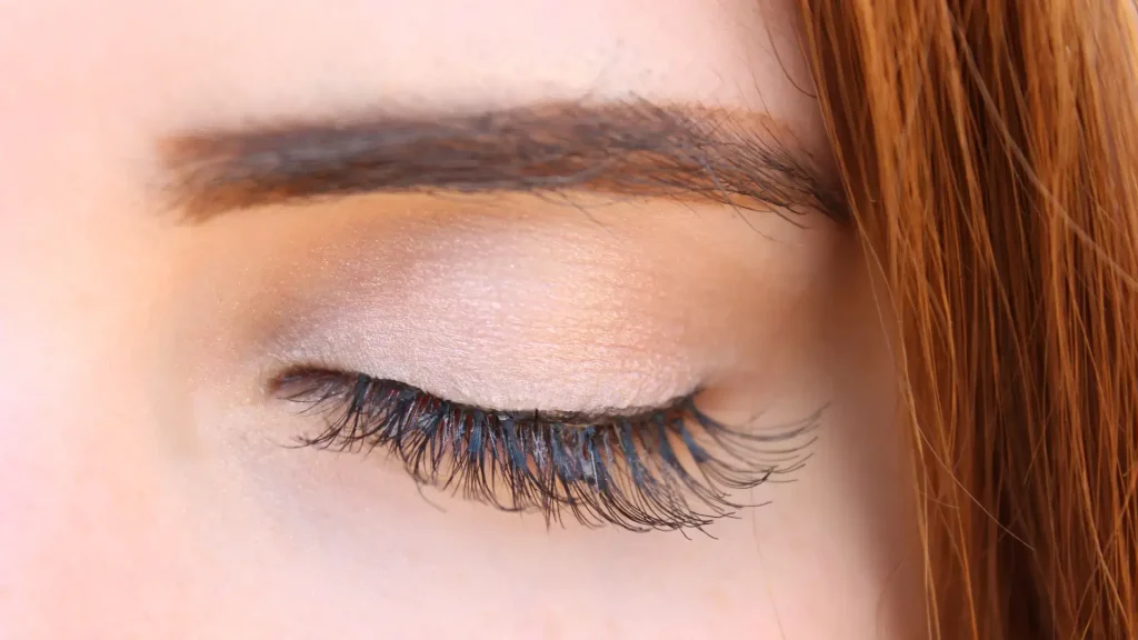 An individual's longer and fuller eyelashes.