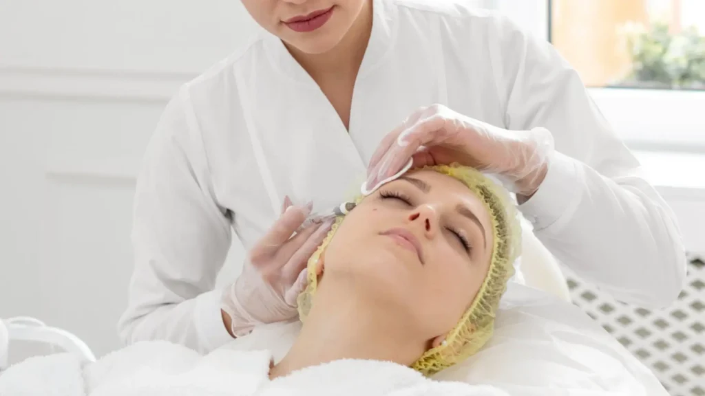 An individual receiving facial injection.