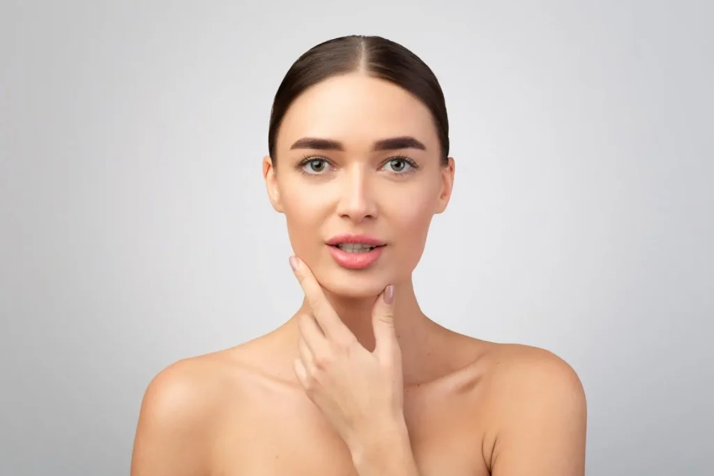 An individual showing off their smooth, firm skin.