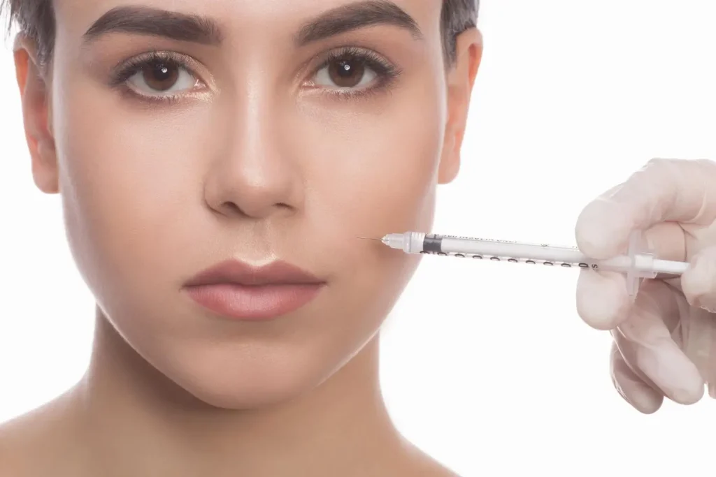 An individual undergoing a facial injection.