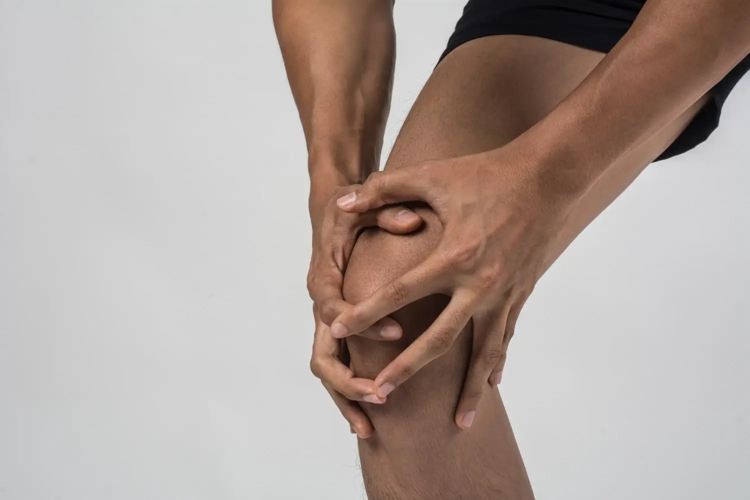 An individual suffering from knee pain.