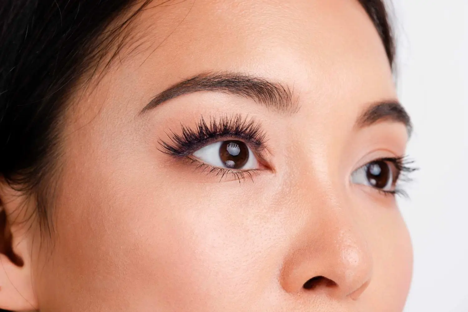 An individual's longer and fuller eyelashes.