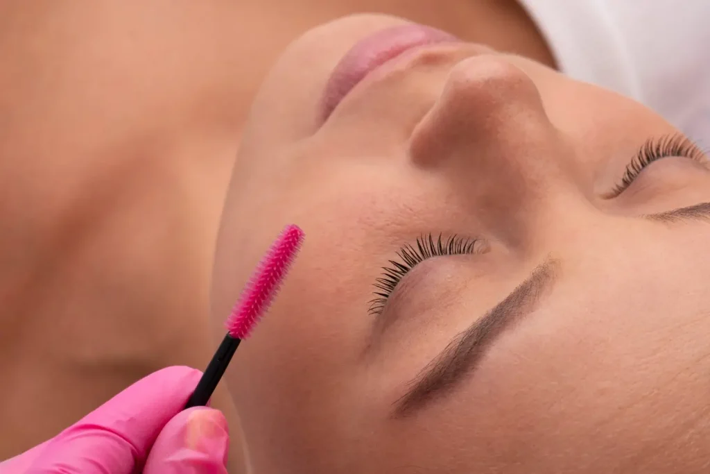 An individual undergoing an evaluation of their eyelashes.