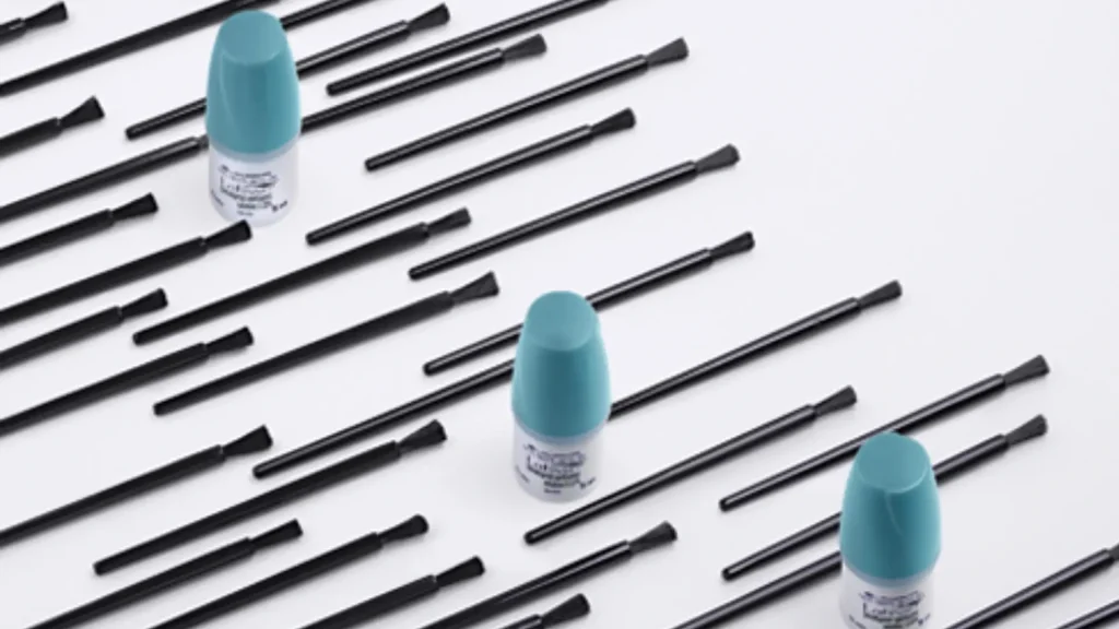 Three Latisse solutions and applicator brushes.