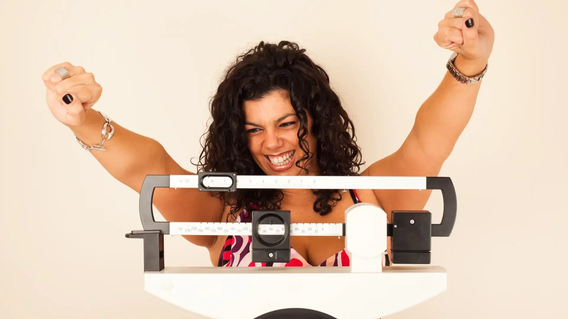 An individual enjoying their weight loss management progress.