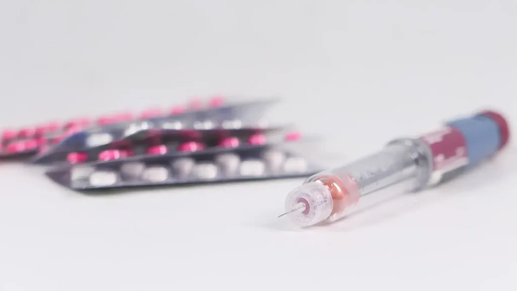 An injectable pen and oral medications.