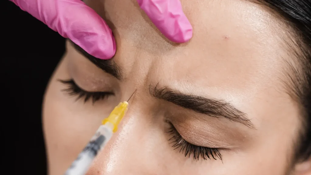 An individual undergoing an injection for their '11' lines.