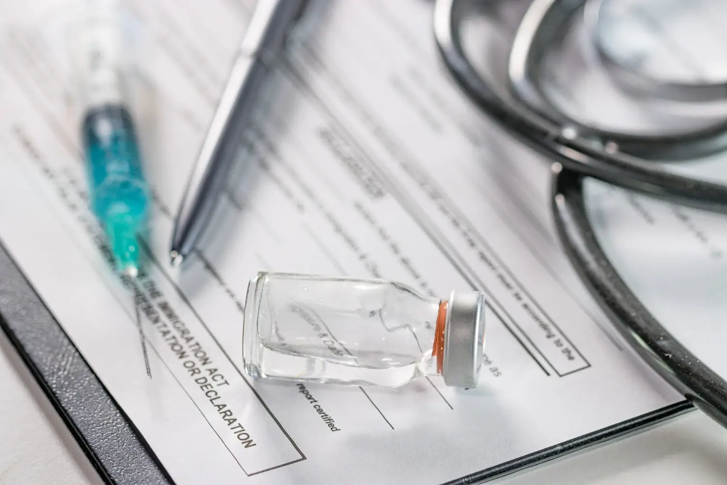 A close-up shot of a medical solution and injection for FDA approval.