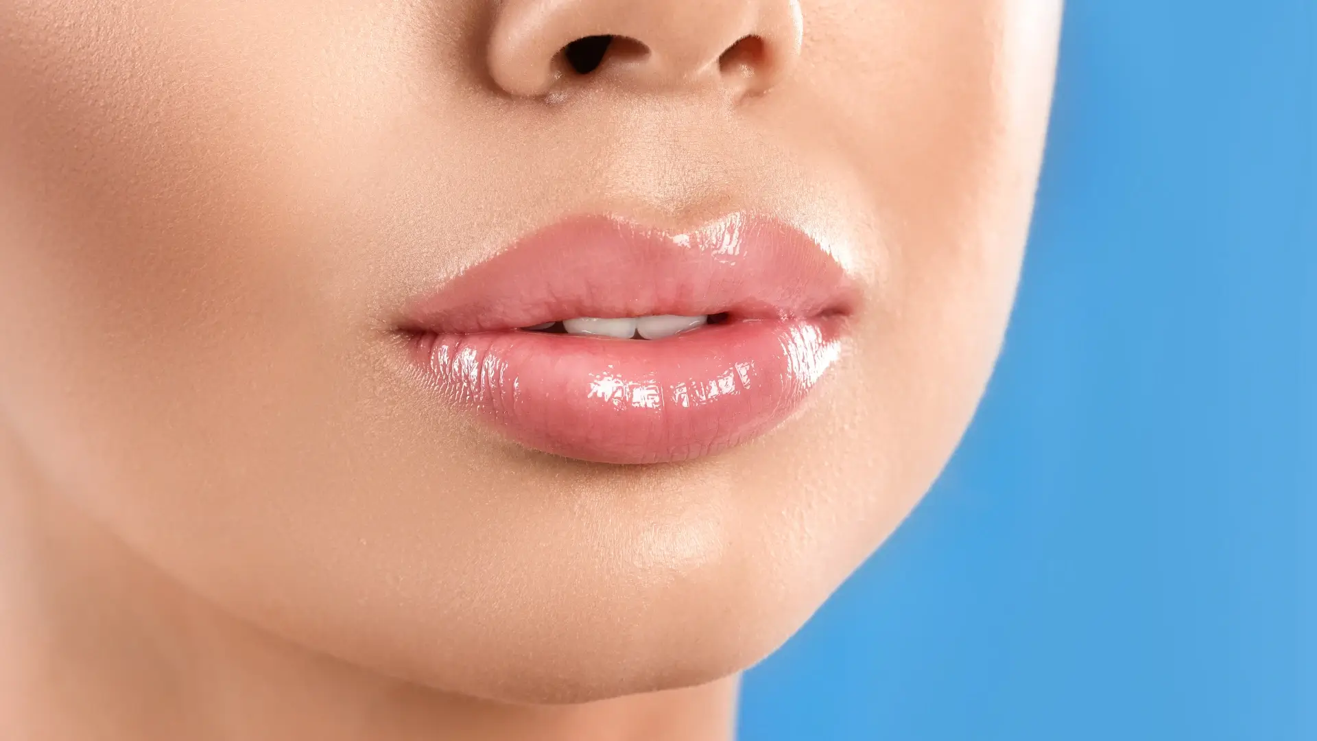 An individual showing a fuller, and plumper lips.