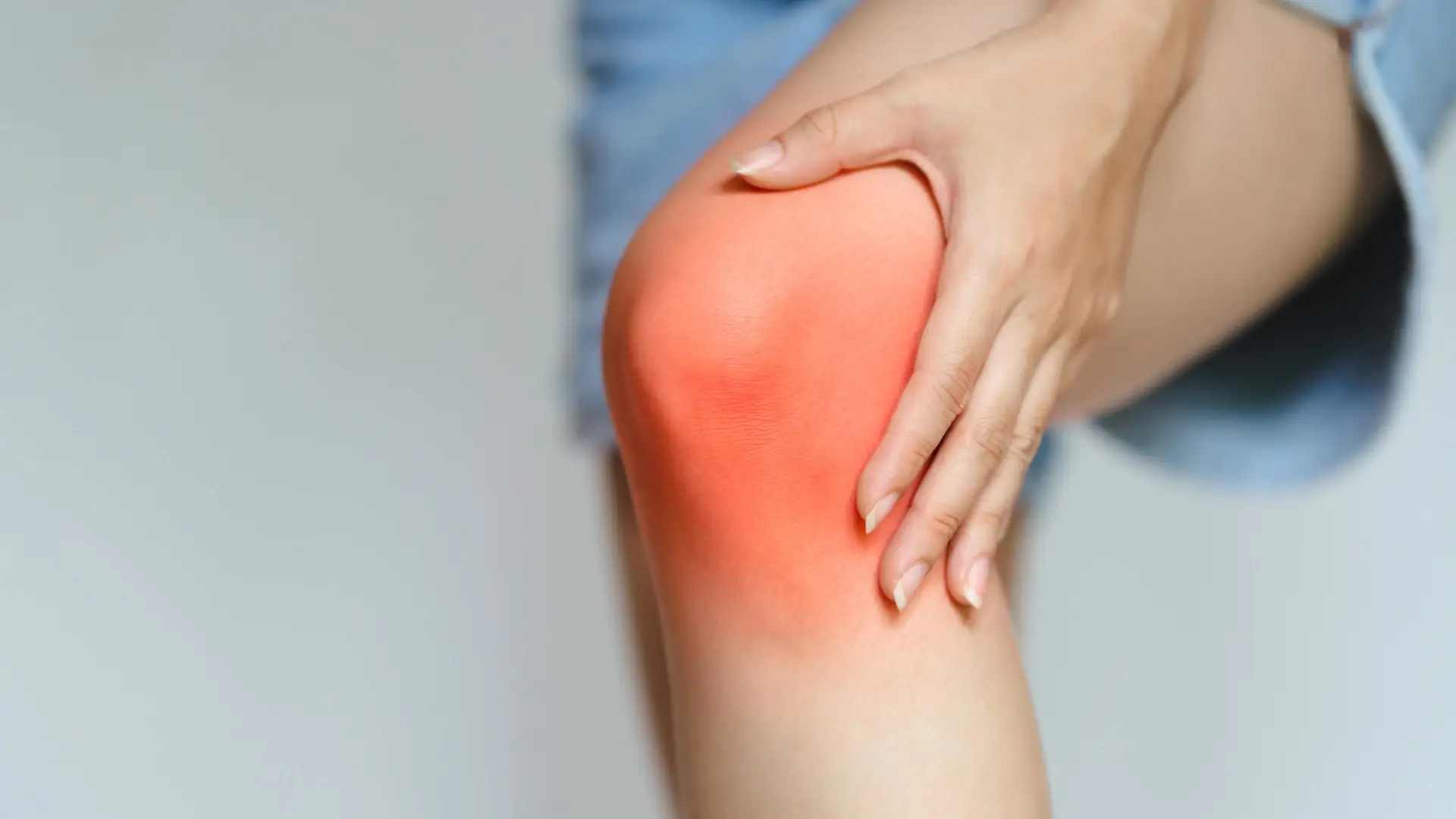 An individual suffering from knee pain.