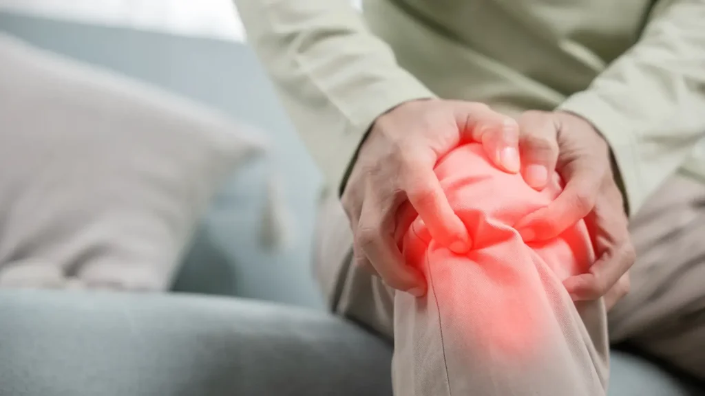 An individual suffering from knee pain.