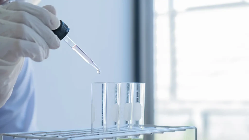 A medical expert working on the formulations in a laboratory.