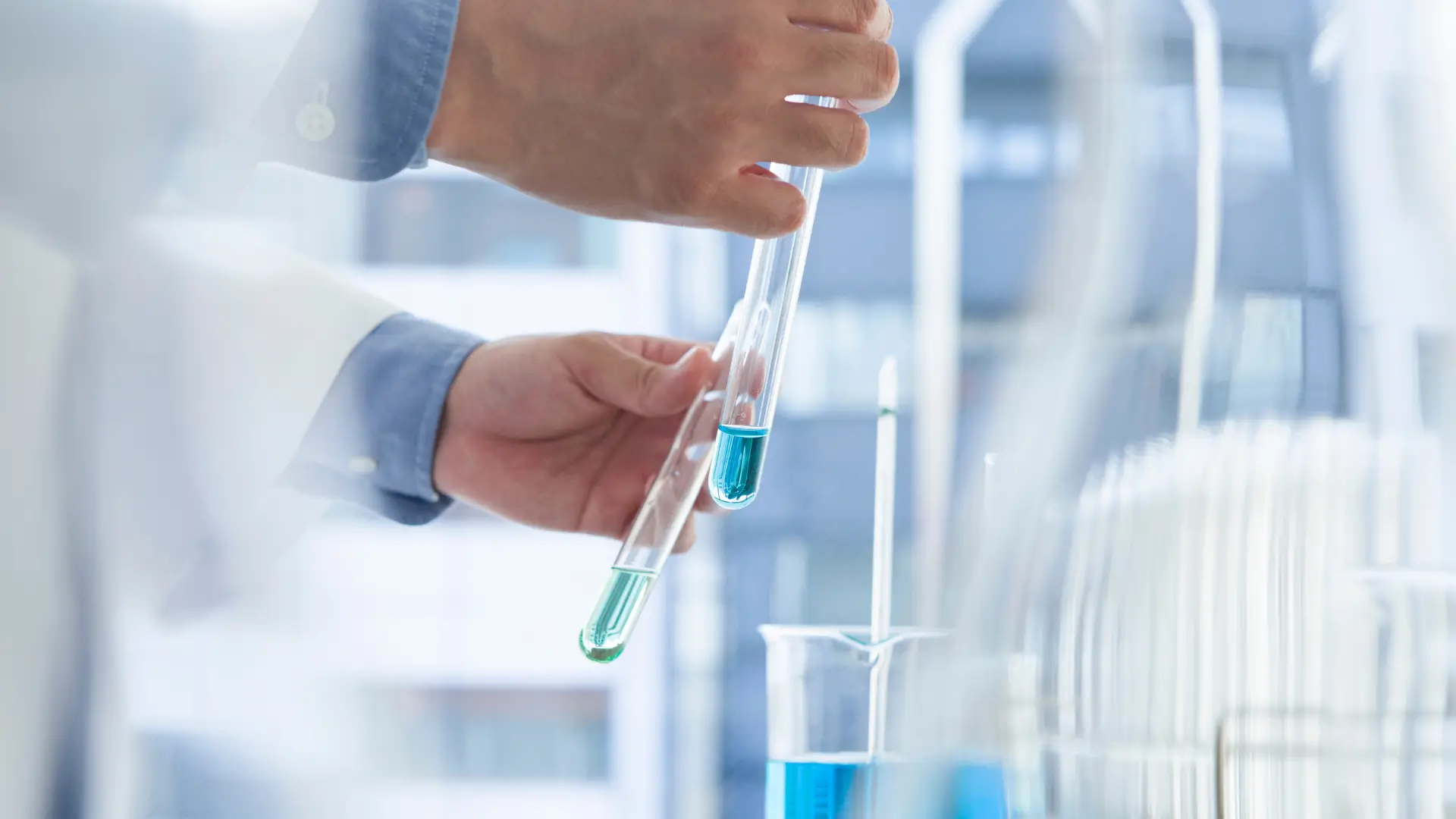 A medical expert working in a laboratory with different formulations.