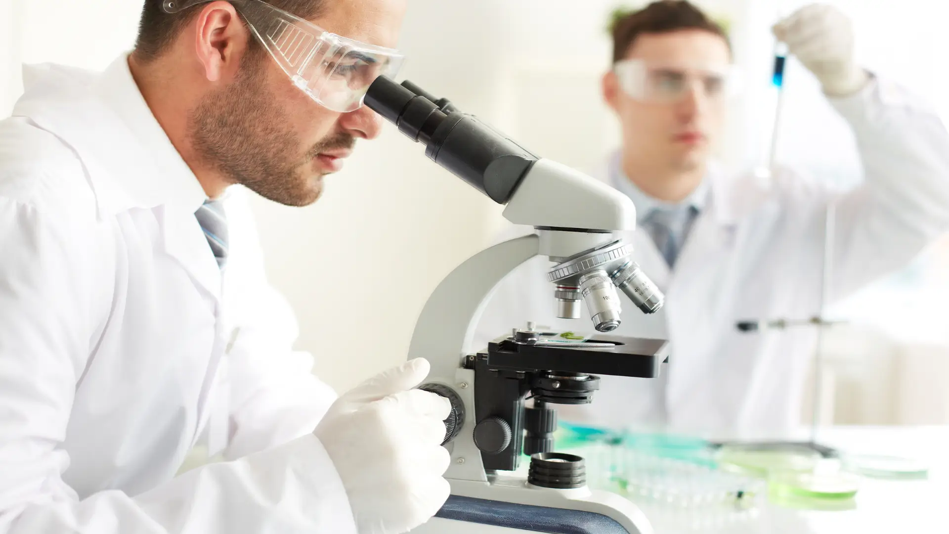 Medical professionals working in with formulations in a laboratory.