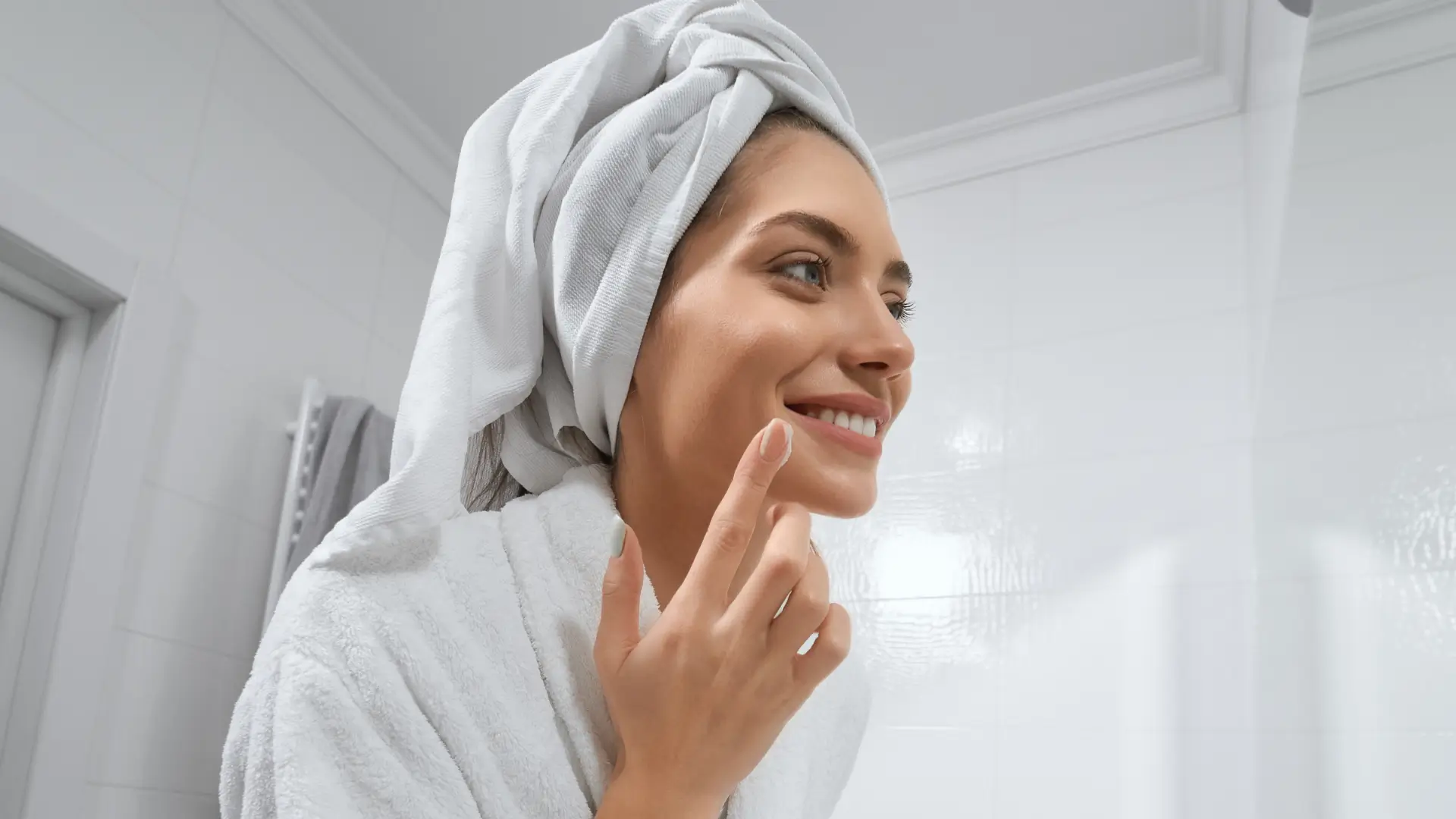 An individual doing their skincare routine.