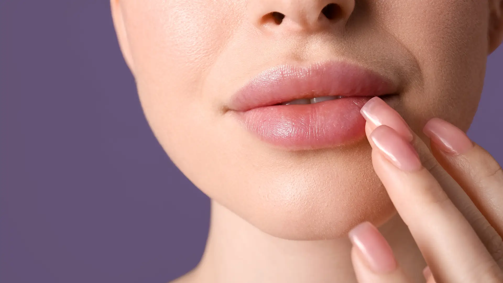 An individual showing off their plumper lip region.
