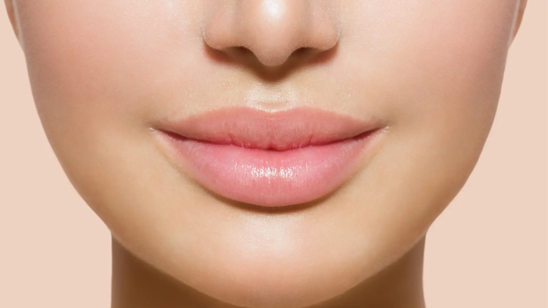 An individual's fuller and plumper lips.