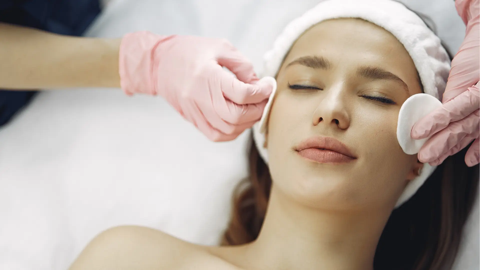 An individual undergoing a facial consultation.