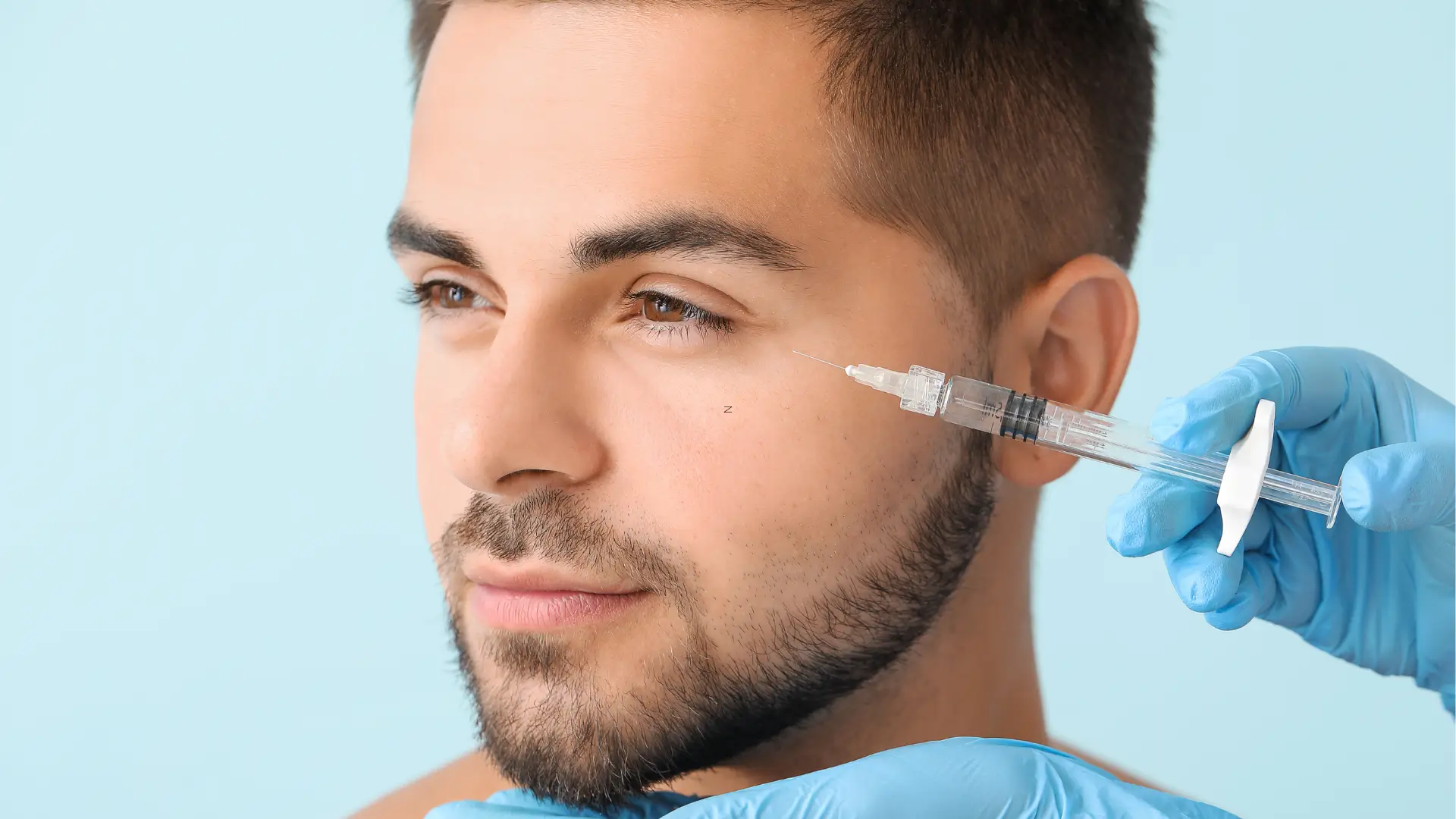 A patient receiving a dermal filler injection for their face.