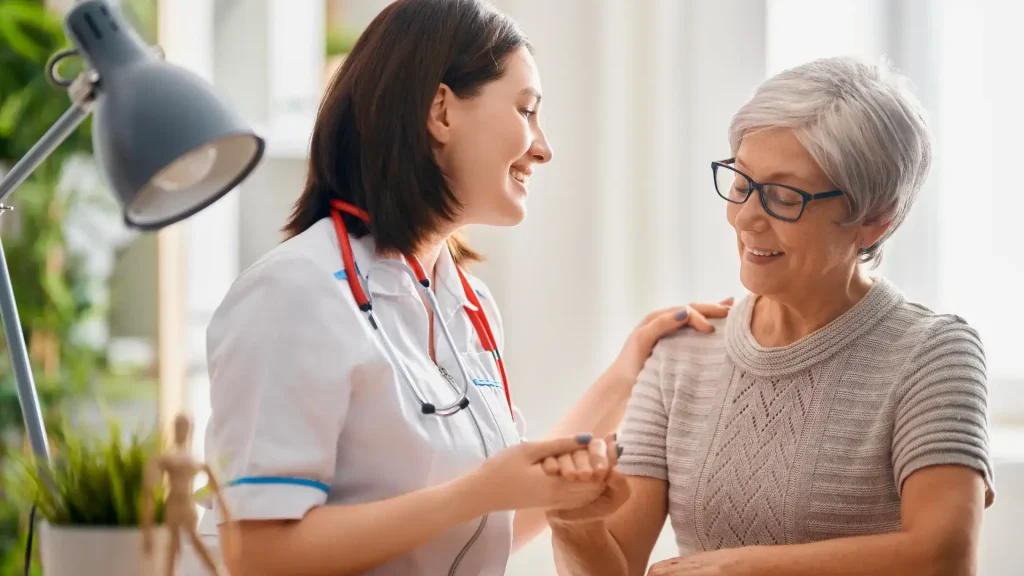An elderly individual undergoing a consultation with a medical professional.
