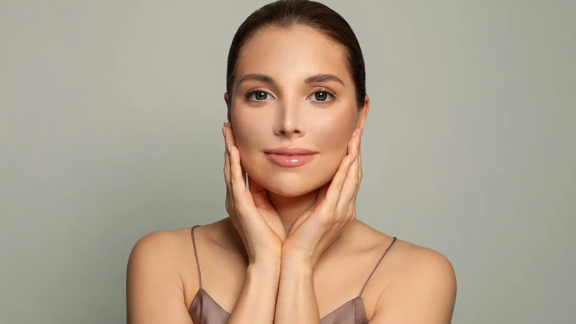An individual showing off their clear, hydrated skin.