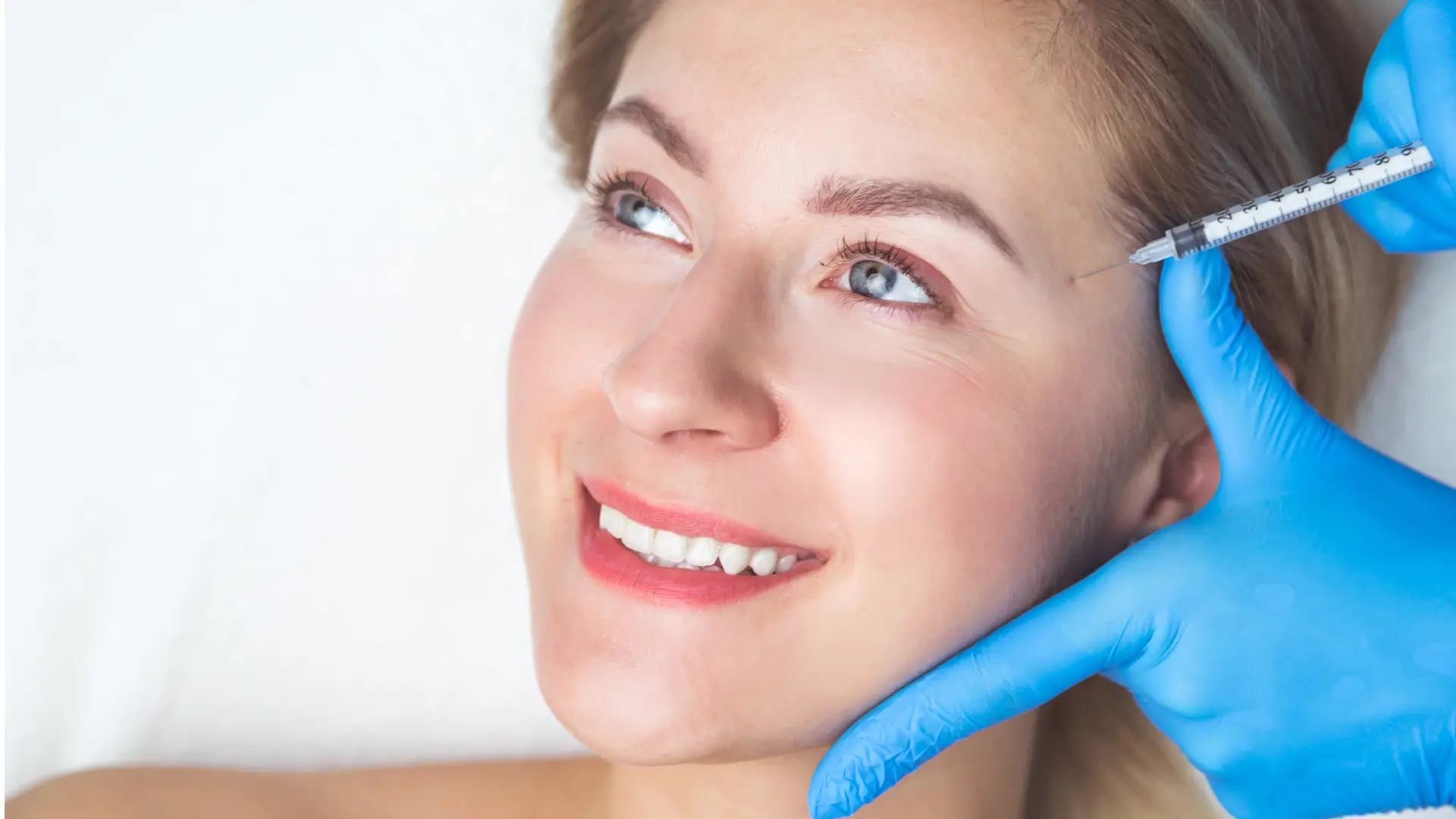 An individual receiving a facial rejuvenation injectable treatment.