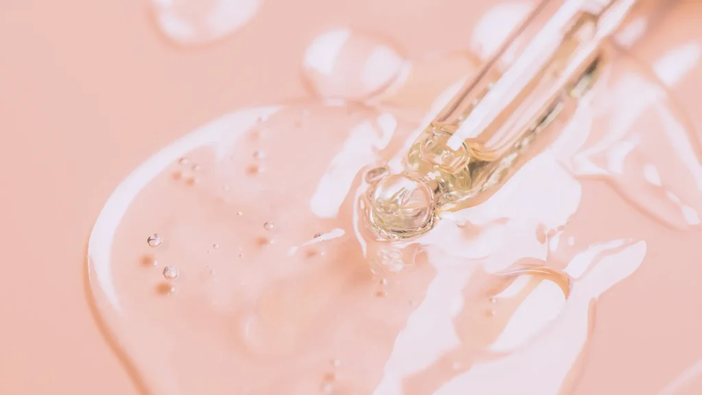 A close-up shot of hyaluronic acid and dropper.