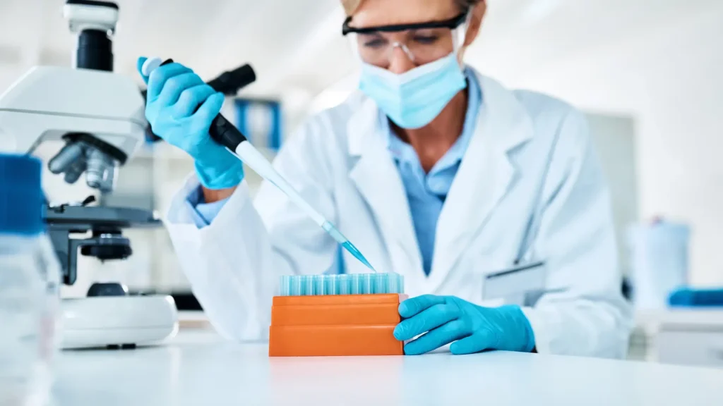 A medical professional conducting a clinical trial in a laboratory.