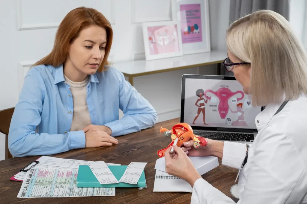 A woman undergoing a consultation with a medical professional.